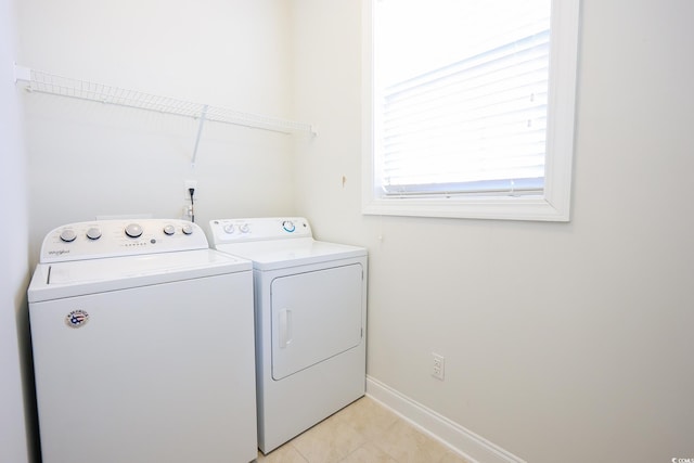 laundry room featuring washer and clothes dryer