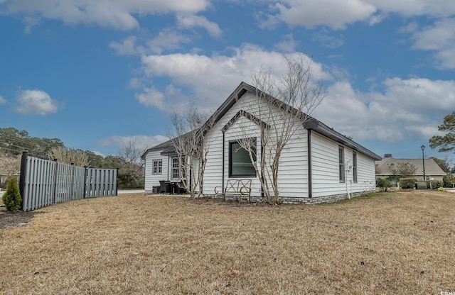 view of property exterior featuring a yard