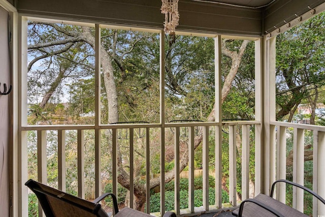 unfurnished sunroom with a healthy amount of sunlight