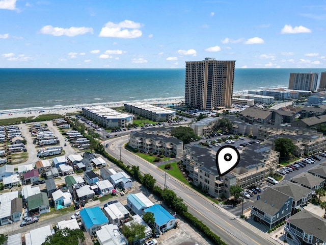 bird's eye view featuring a view of city and a water view