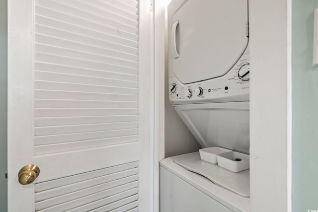 laundry room with laundry area and stacked washing maching and dryer