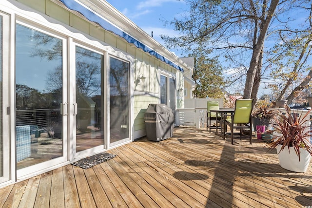 wooden deck with area for grilling