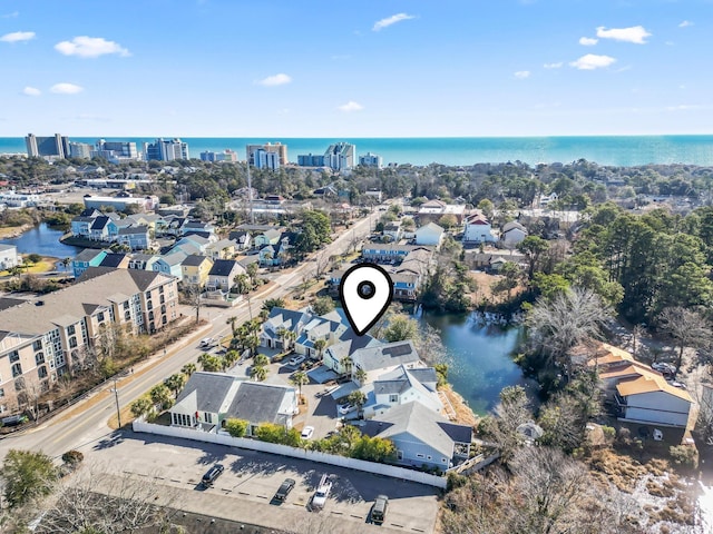 drone / aerial view featuring a water view