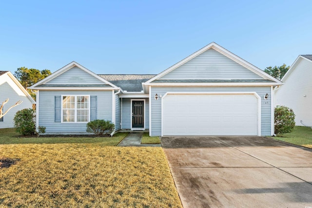 ranch-style home with a garage and a front lawn