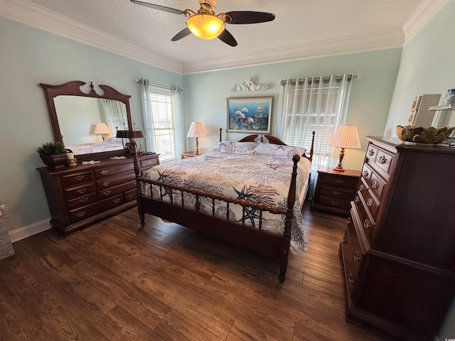 bedroom with crown molding, dark wood-type flooring, a textured ceiling, and ceiling fan