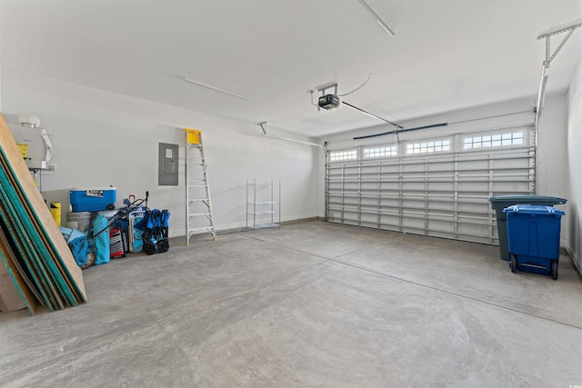 garage with electric panel and a garage door opener