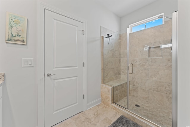 bathroom featuring an enclosed shower