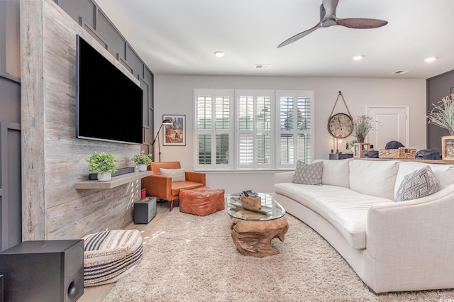 living room featuring ceiling fan