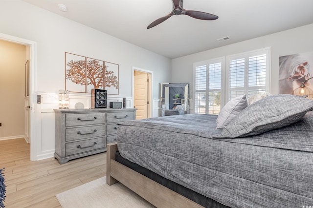 bedroom featuring light wood-type flooring and ceiling fan