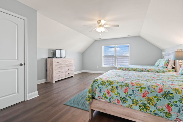 bedroom with vaulted ceiling, ceiling fan, and dark hardwood / wood-style flooring