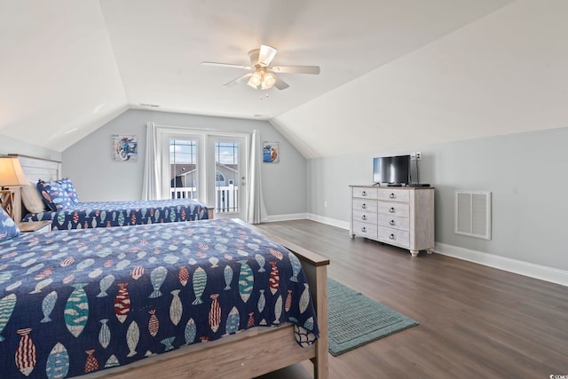 bedroom with ceiling fan, access to exterior, dark hardwood / wood-style floors, and vaulted ceiling