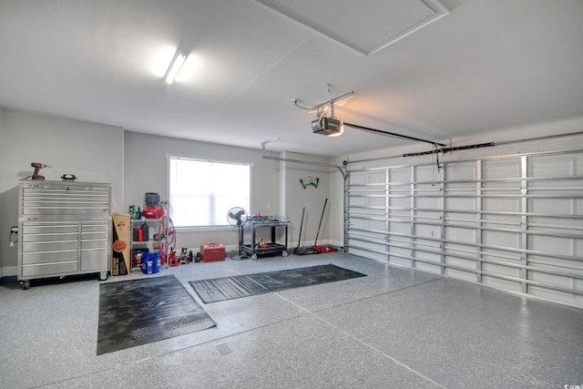 garage featuring a garage door opener