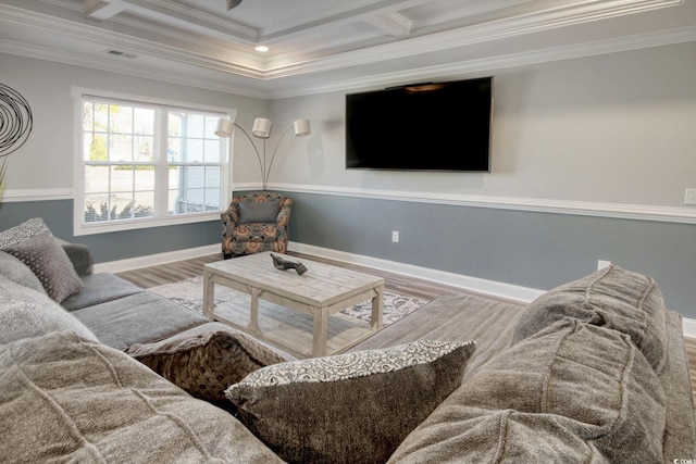 living room with hardwood / wood-style flooring, coffered ceiling, and ornamental molding