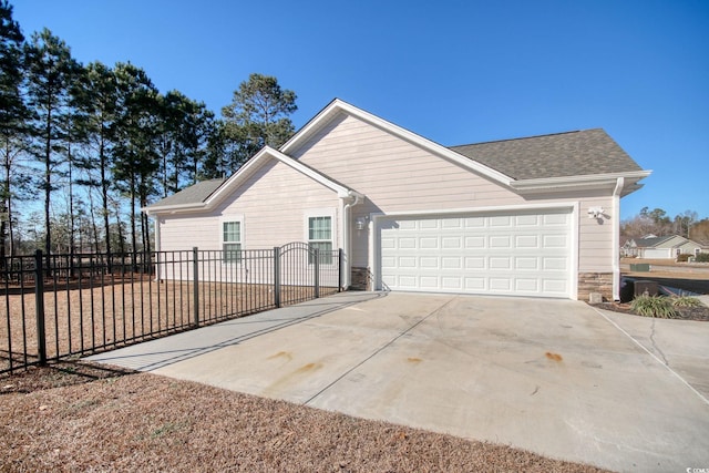 view of front of property featuring a garage