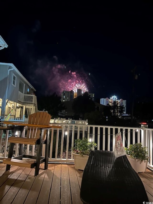 view of deck at twilight