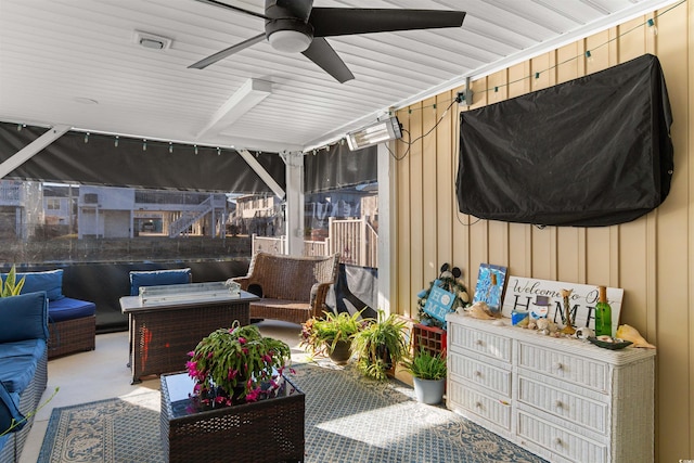 view of patio / terrace featuring an outdoor living space and ceiling fan