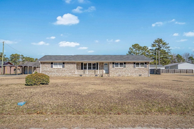 ranch-style home with a front yard