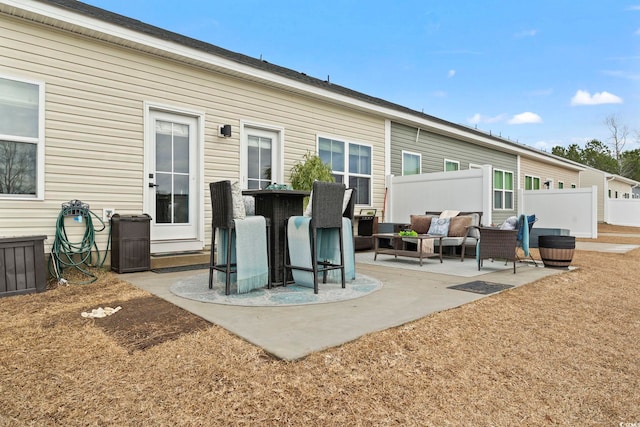 rear view of house featuring a patio