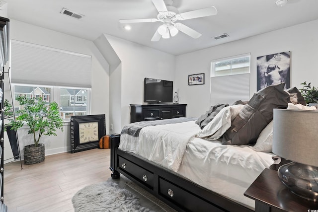 bedroom featuring ceiling fan and light wood-type flooring