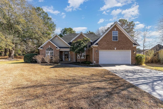 front facade with a garage and a front yard