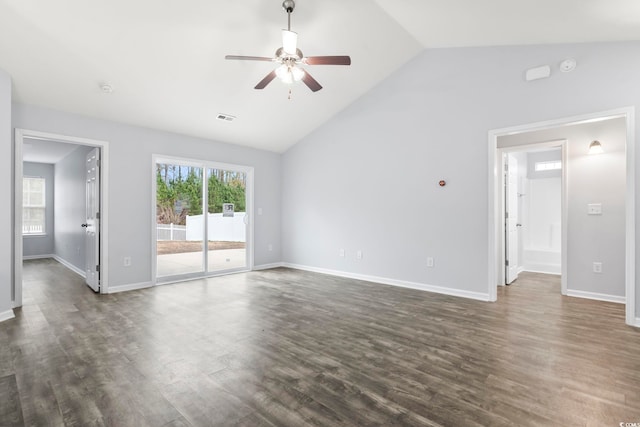 spare room featuring lofted ceiling, dark hardwood / wood-style floors, and ceiling fan