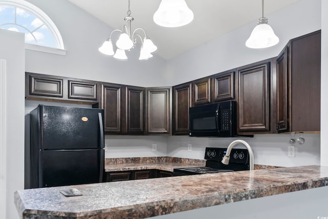 kitchen featuring decorative light fixtures, lofted ceiling, a notable chandelier, black appliances, and dark brown cabinets