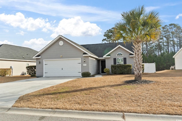 ranch-style home with a garage