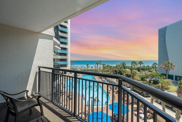 balcony at dusk with a water view