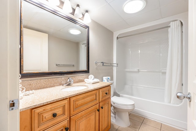 full bathroom featuring shower / tub combination, toilet, vanity, and tile patterned flooring