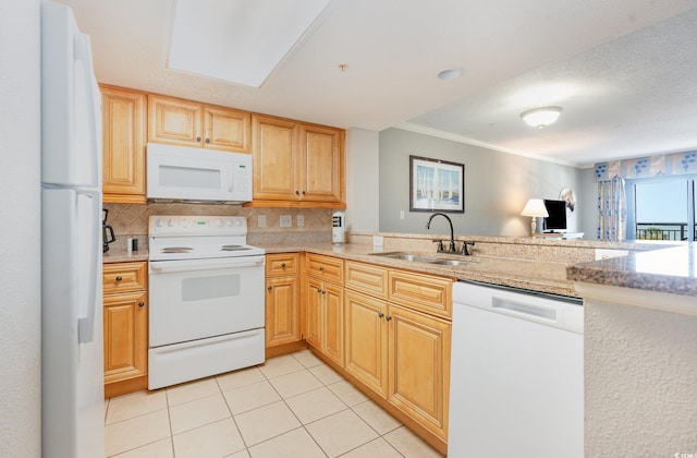 kitchen featuring white appliances, sink, kitchen peninsula, ornamental molding, and light tile patterned floors