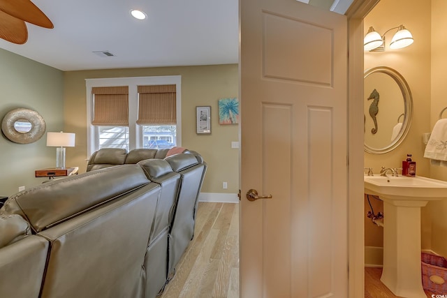 living room with light hardwood / wood-style floors