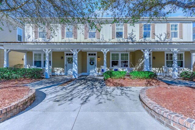 multi unit property featuring covered porch