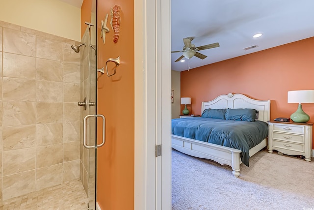 bedroom with ceiling fan and carpet