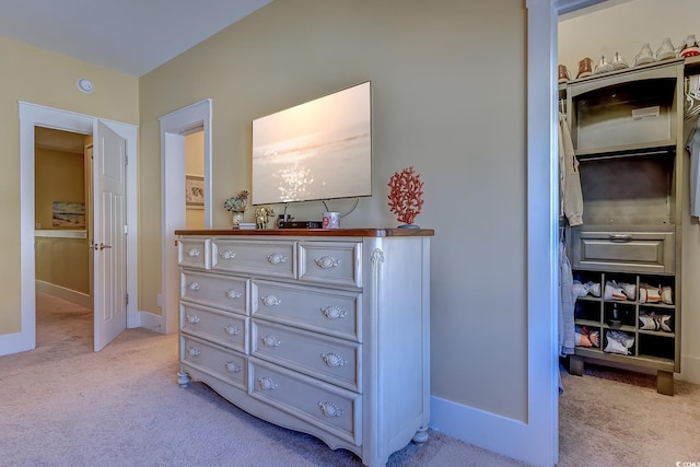 bedroom with light carpet