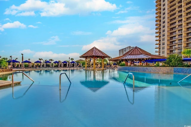 view of swimming pool featuring a gazebo