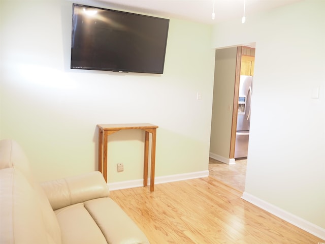 unfurnished living room with light hardwood / wood-style floors