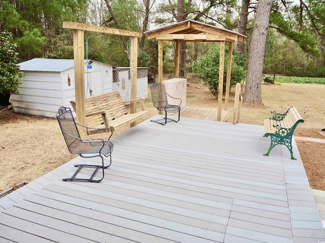 wooden deck with a shed