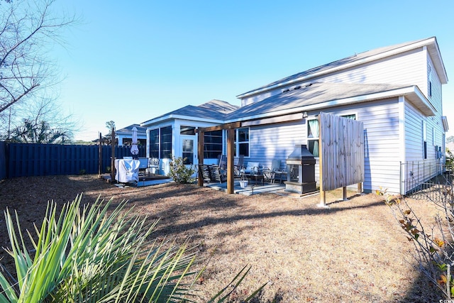 back of house featuring a patio