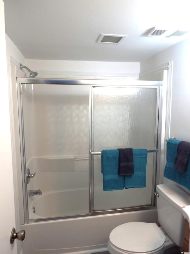 1605 S Ocean Blvd Unit 1602, Myrtle Beach, SC 29577 - bathroom featuring toilet and bath / shower combo with glass door
