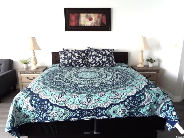 1605 S Ocean Blvd Unit 1602, Myrtle Beach, SC 29577 - bedroom featuring hardwood / wood-style floors