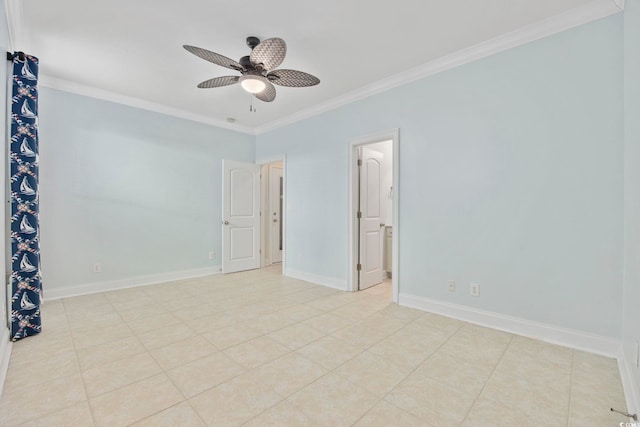 tiled empty room featuring ornamental molding and ceiling fan