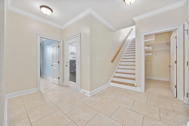 interior space with light tile patterned floors and crown molding