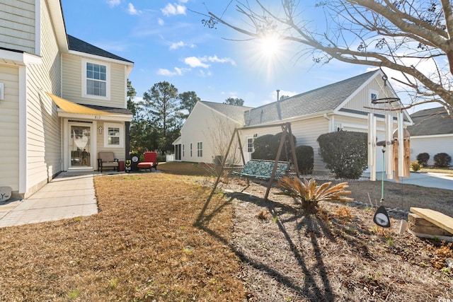 view of home's exterior with a patio