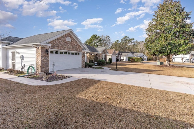 exterior space with a lawn and a garage