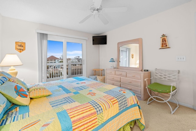 carpeted bedroom featuring ceiling fan and access to exterior