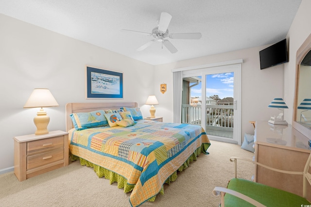 bedroom featuring ceiling fan, access to exterior, and light carpet