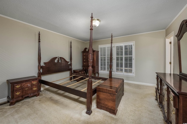 bedroom featuring baseboards, light carpet, a textured ceiling, and ornamental molding