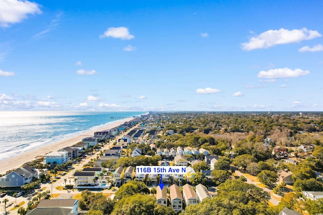 bird's eye view with a water view and a view of the beach