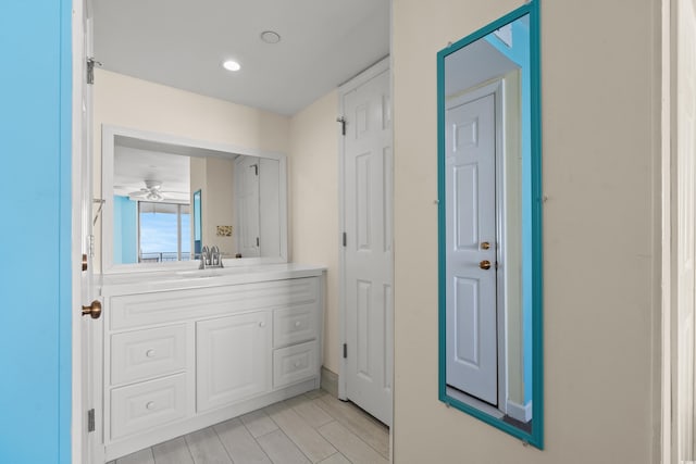 bathroom with vanity and ceiling fan