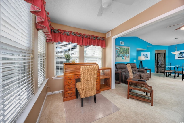 office with light carpet, a textured ceiling, lofted ceiling, and ceiling fan